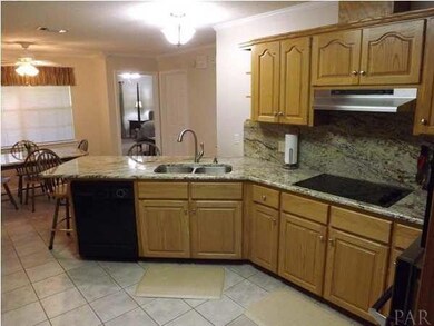 Kitchen with breakfast bar and plenty of cabinets