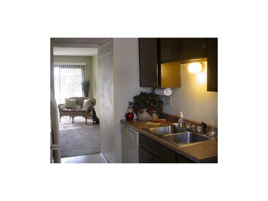 newer sink and countertops in kitchen