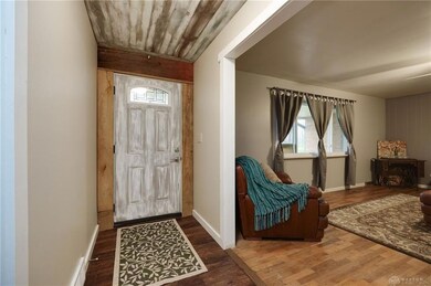The recently updated entryway is unique and eye ca