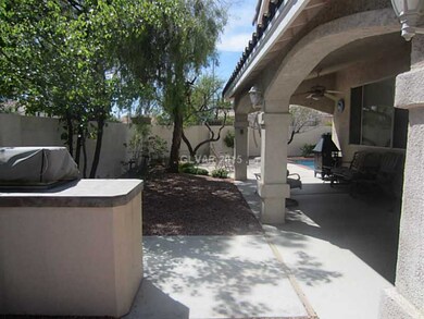 Property Photo. Covered patio and built-in BBQ
