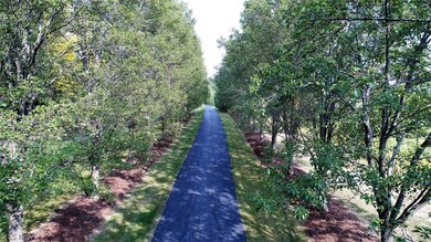 The 400 foot, tree lined driveway gives you that 