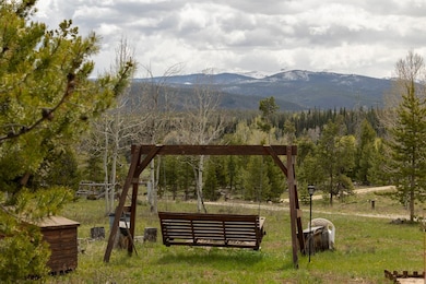 View of property's community featuring a mountain
