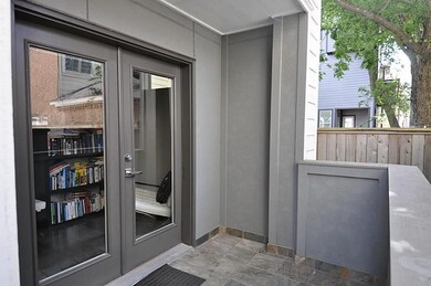 The side patio that leads to the other entrance.