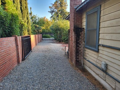 Long Driveway from Front of Property to one Car De