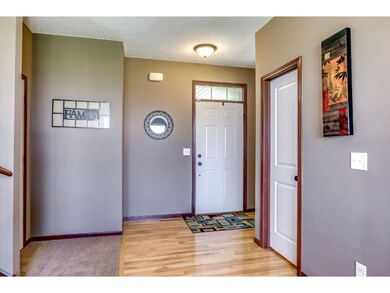 Foyer/Entry with 1/2 bath tucked to one side.