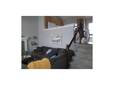 Living room, stairs have new iron spindles