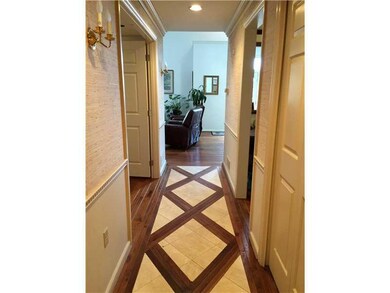 Entry/Foyer. Floor is an elegant combination of ma
