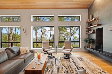 DTBB great room is very similar, but ceiling will slope in the opposite direction, back window wall will be two feet higher, and back wall window will have a fixed window above the operable window