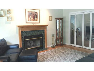 Living Room. French Gass Doors to Den