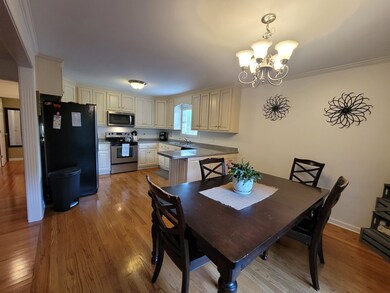 Spacious, open eat-in kitchen with beautiful flooring