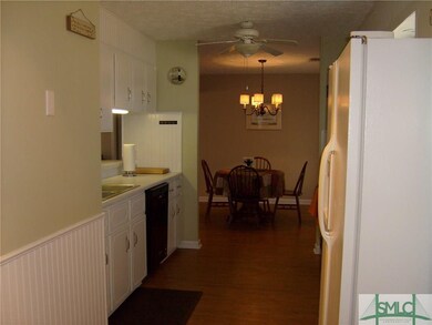 Looking from End of Kitchen into Dining Room. Ther