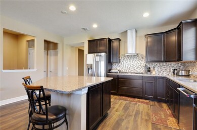 Granite Counters & Mosaic Tile Backsplash
