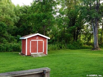 Exterior Back. Nice backyard with some wooded area