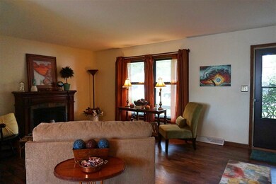 View of the living room off of the front door entr