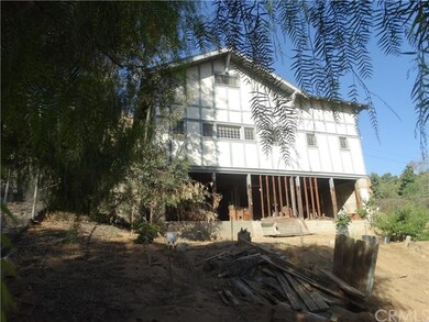 West facing frontage.  The downstairs has stairway