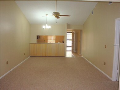 Living area with vaulted ceilings