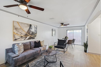 Living room with hardwood / wood-style floors and 
