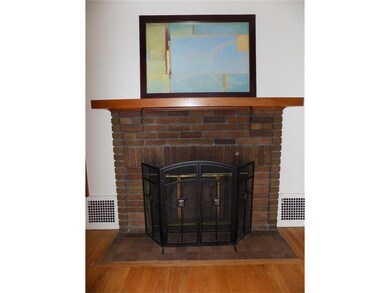 Snuggle up and enjoy the front formal room, wood b