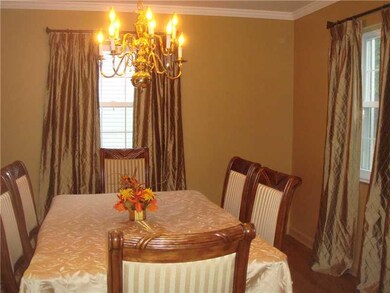 Dining Room. The formal dining room has crown mold
