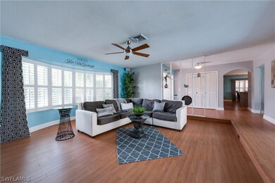 BAY WINDOWS WITH CUSTOM PLANTATION SHUTTERS.