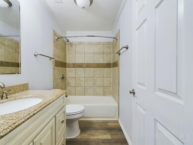 Bathroom featuring washtub / shower combination, 