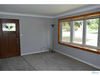 Entry. Enormous bay window lets in lots of natural