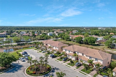 Drone / aerial view with a water view and a reside