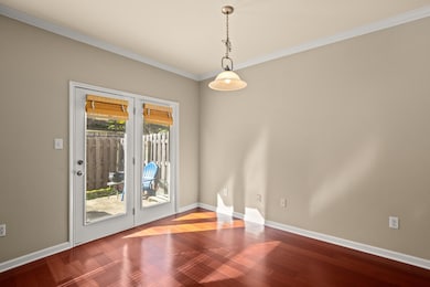 Unfurnished room featuring wood finished floors, 