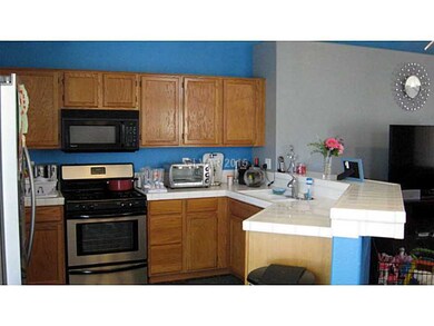 Kitchen. Conveniently located kitchen next to dini
