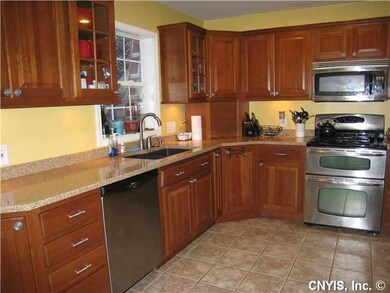 Kitchen. Gourmet kitchen with cherry cabinets and 