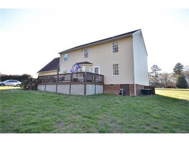 Picture of rear yard and deck.