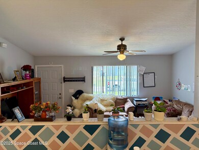 Facing Family Room Over Kitchen Divider