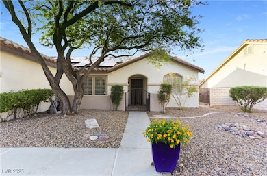 The front of the home features a gated private cou