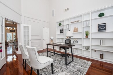 Another view of the office showing large bookcase
