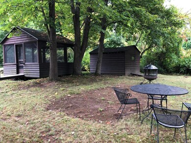 Screen room & storage shed.