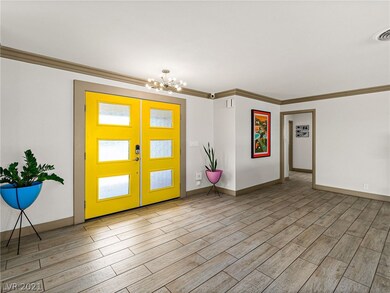 Fluted glass double door entry, fun lighting fixtu