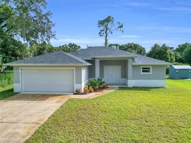 1006 Asther St E, Lehigh Acres, FL 33974 - photo 6