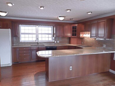 That is open to the eat-in kitchen...
