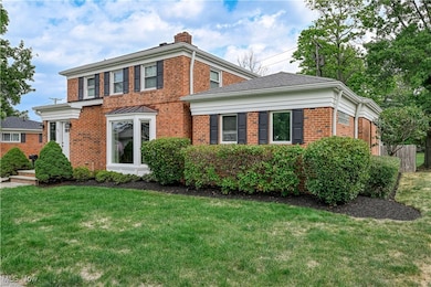 View of front of house featuring brick siding
