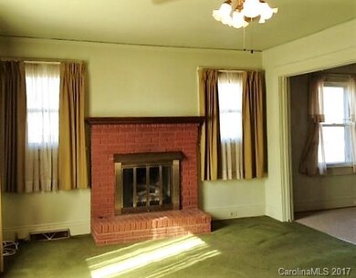 Living Room- Bright & Welcoming--Masonry Fireplace