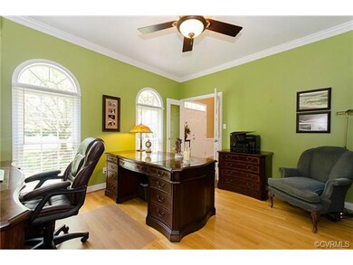 First floor study, complete with arched windows an
