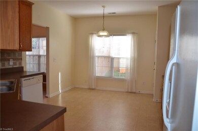 View looking at breakfast area in kitchen.  Dining room is next room over.