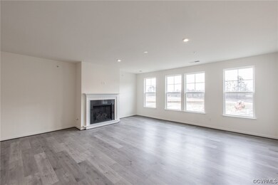 Actual home being built does not have a fireplace.