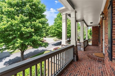 A spacious front porch perfect for sipping your morning coffee or enjoy evening chats.