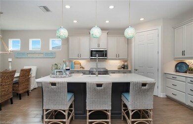 Kitchen Island with painted base and custom lights