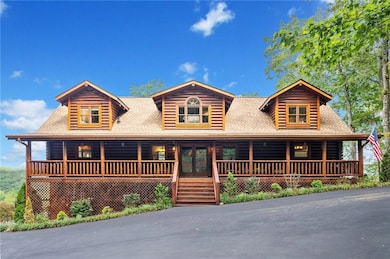 Log-style house with roof with shingles, french do