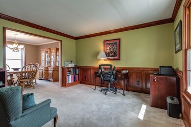 The formal living room can be used for an office, sitting area, or library!