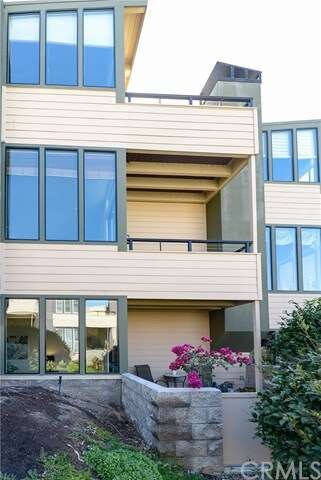 Rear of Townhome Showing View Balconies and Patio