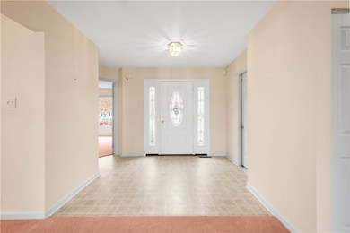 A LARGE ENTRY WELCOMES GUESTS INTO THE HOME. NEW FRONT DOOR!