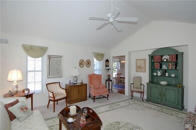 The living room is light and bright and features n